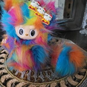 Colorful Furry Toy with Hello Kitty Accents